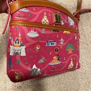 Disney’s Dooney and Bourke crossbody parks life.